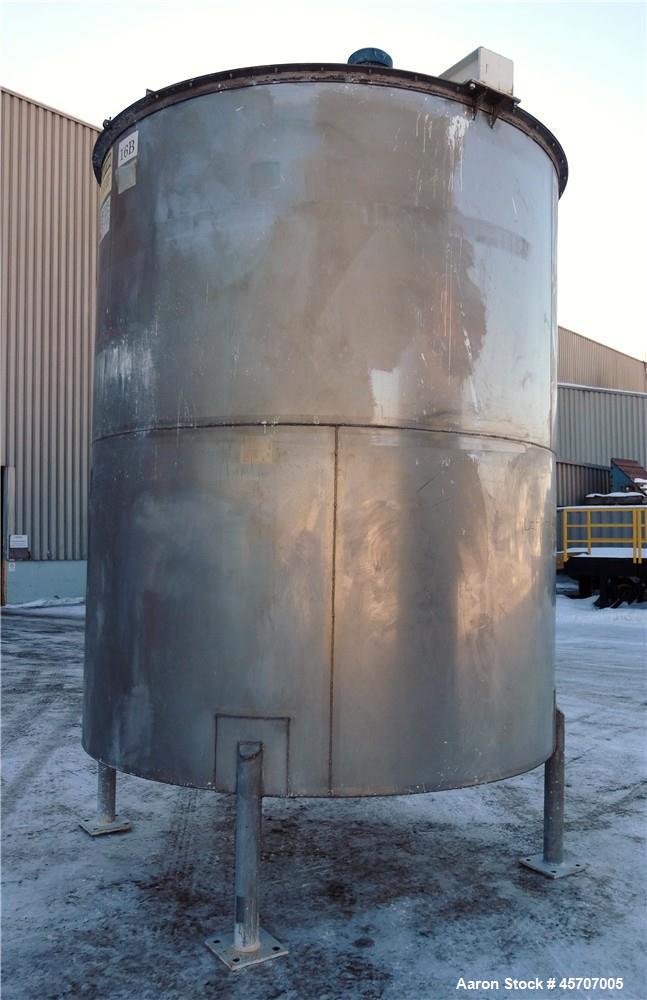 Used Bright Sheet Metal Tank, Approximately 4,000 Gallon, 304 Stainless Steel, Vertical. 100" diameter x 120" straight side. Flat top, coned bottom. 34" x 32" top hinged manway cover, 2" center botto...