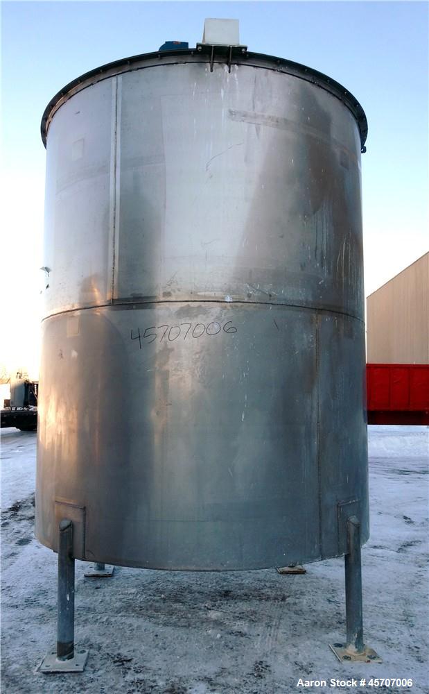 Used Bright Sheet Metal Tank, Approximately 4,000 Gallon, 304 Stainless Steel, Vertical. 100" diameter x 120" straight side. Flat top, coned bottom. 34" x 32" top hinged manway cover, 2" center botto...