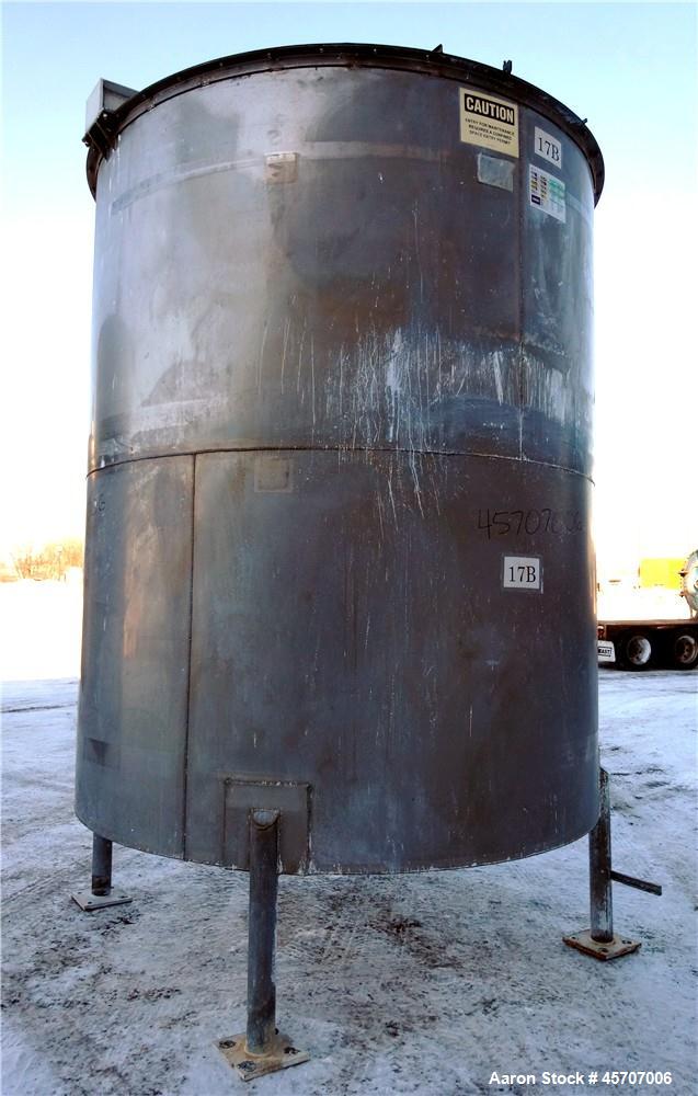 Used Bright Sheet Metal Tank, Approximately 4,000 Gallon, 304 Stainless Steel, Vertical. 100" diameter x 120" straight side. Flat top, coned bottom. 34" x 32" top hinged manway cover, 2" center botto...