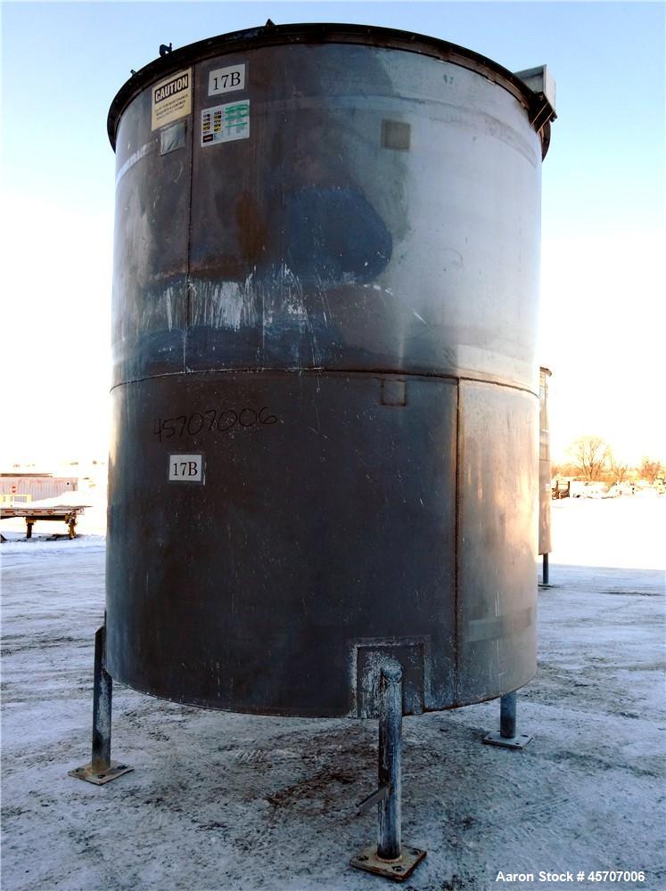 Used Bright Sheet Metal Tank, Approximately 4,000 Gallon, 304 Stainless Steel, Vertical. 100" diameter x 120" straight side. Flat top, coned bottom. 34" x 32" top hinged manway cover, 2" center botto...