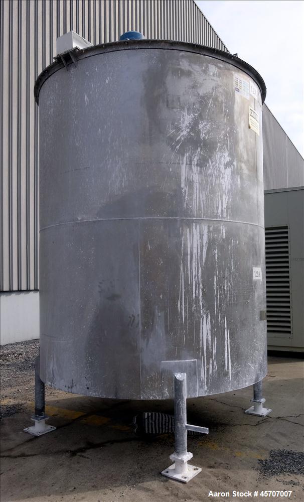 Used Bright Sheet Metal Tank, Approximately 4,000 Gallon, 304 Stainless Steel, Vertical. 100" diameter x 120" straight side. Flat top, coned bottom. 34" x 32" top hinged manway cover, 2" center botto...