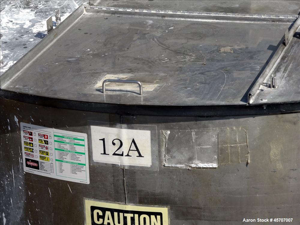 Used Bright Sheet Metal Tank, Approximately 4,000 Gallon, 304 Stainless Steel, Vertical. 100" diameter x 120" straight side. Flat top, coned bottom. 34" x 32" top hinged manway cover, 2" center botto...