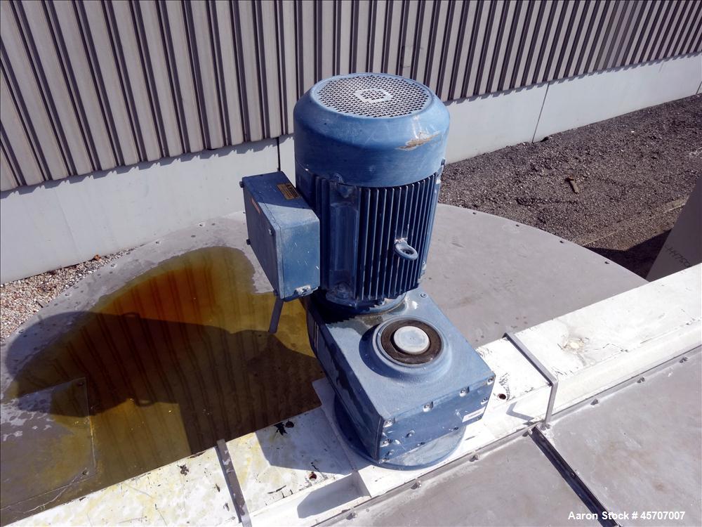 Used Bright Sheet Metal Tank, Approximately 4,000 Gallon, 304 Stainless Steel, Vertical. 100" diameter x 120" straight side. Flat top, coned bottom. 34" x 32" top hinged manway cover, 2" center botto...