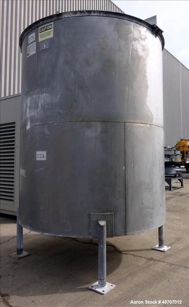 Used Bright Sheet Metal Tank, Approximately 4,000 Gallon, 304 Stainless Steel, Vertical. 100" diameter x 120" straight side. Flat top, coned bottom. 34" x 32" top hinged manway cover, 2" center botto...
