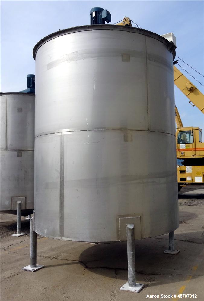 Used Bright Sheet Metal Tank, Approximately 4,000 Gallon, 304 Stainless Steel, Vertical. 100" diameter x 120" straight side. Flat top, coned bottom. 34" x 32" top hinged manway cover, 2" center botto...