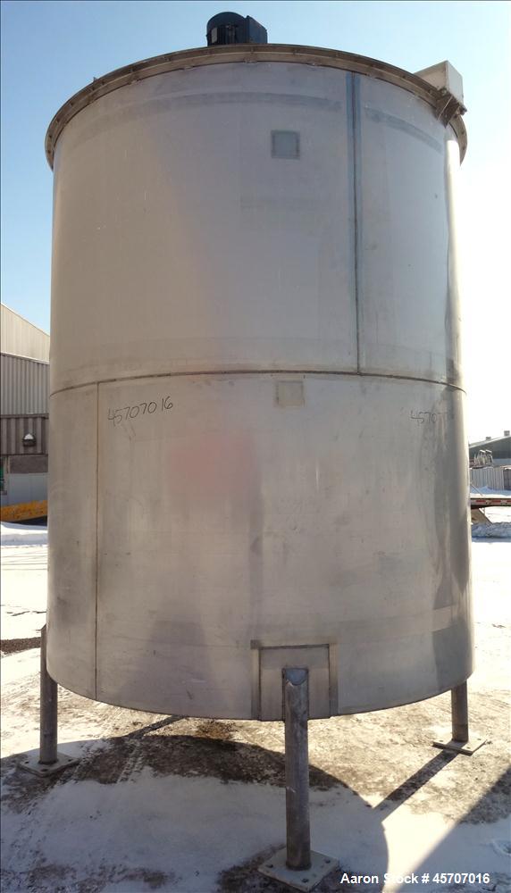 Used Bright Sheet Metal Tank, Approximately 4,000 Gallon, 304 Stainless Steel, Vertical. 100" diameter x 120" straight side. Flat top, coned bottom. 34" x 32" top hinged manway cover, 2" center botto...
