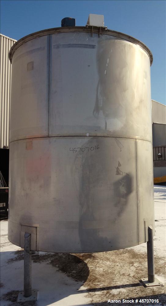 Used Bright Sheet Metal Tank, Approximately 4,000 Gallon, 304 Stainless Steel, Vertical. 100" diameter x 120" straight side. Flat top, coned bottom. 34" x 32" top hinged manway cover, 2" center botto...