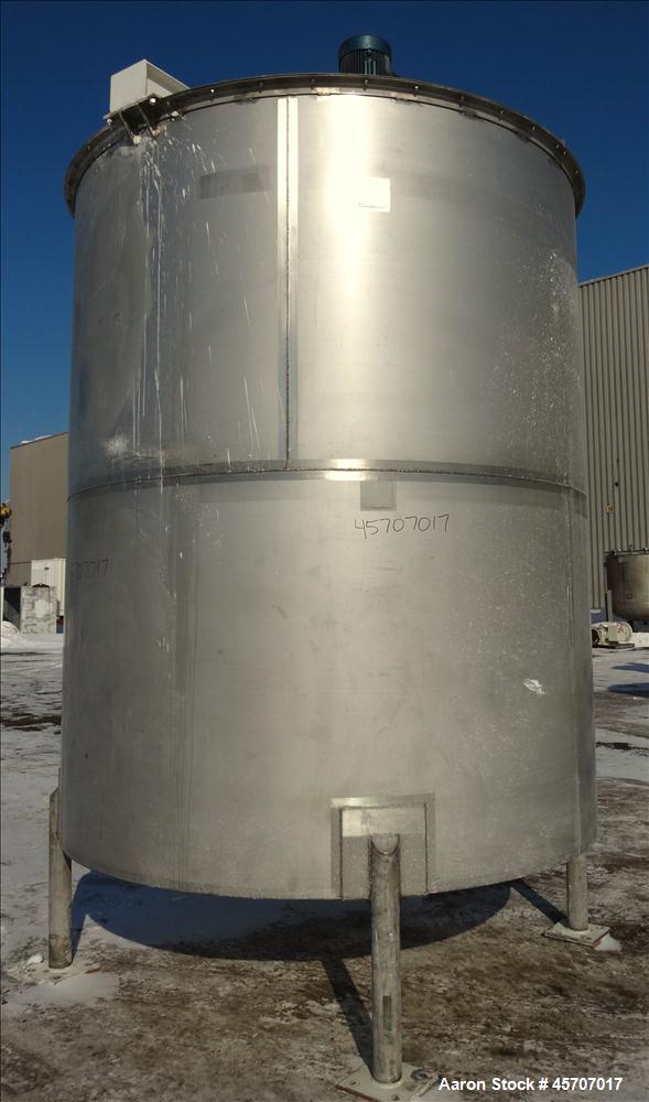 Used Bright Sheet Metal Tank, Approximately 4,000 Gallon, 304 Stainless Steel, Vertical. 100" diameter x 120" straight side. Flat top, coned bottom. 34" x 32" top hinged manway cover, 2" center botto...
