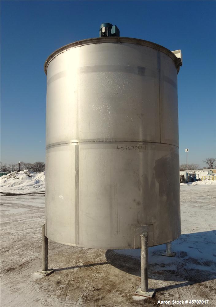 Used Bright Sheet Metal Tank, Approximately 4,000 Gallon, 304 Stainless Steel, Vertical. 100" diameter x 120" straight side. Flat top, coned bottom. 34" x 32" top hinged manway cover, 2" center botto...