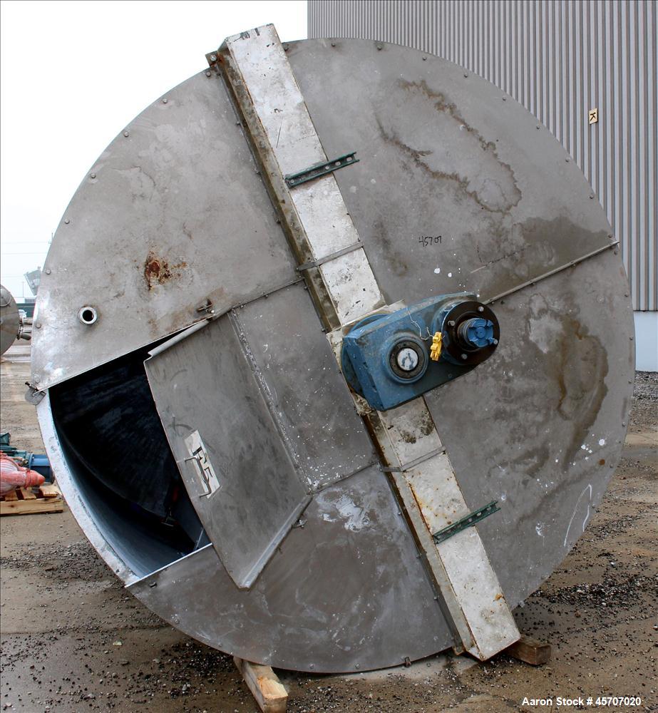 Used Bright Sheet Metal Tank, Approximately 4,000 Gallon, 304 Stainless Steel, Vertical. 100" diameter x 120" straight side. Flat top, coned bottom. 34" x 32" top hinged manway cover, 2" center botto...