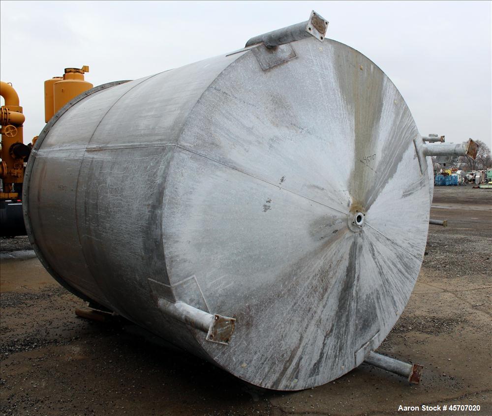 Used Bright Sheet Metal Tank, Approximately 4,000 Gallon, 304 Stainless Steel, Vertical. 100" diameter x 120" straight side. Flat top, coned bottom. 34" x 32" top hinged manway cover, 2" center botto...