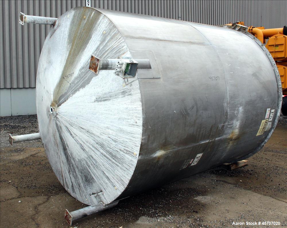 Used Bright Sheet Metal Tank, Approximately 4,000 Gallon, 304 Stainless Steel, Vertical. 100" diameter x 120" straight side. Flat top, coned bottom. 34" x 32" top hinged manway cover, 2" center botto...