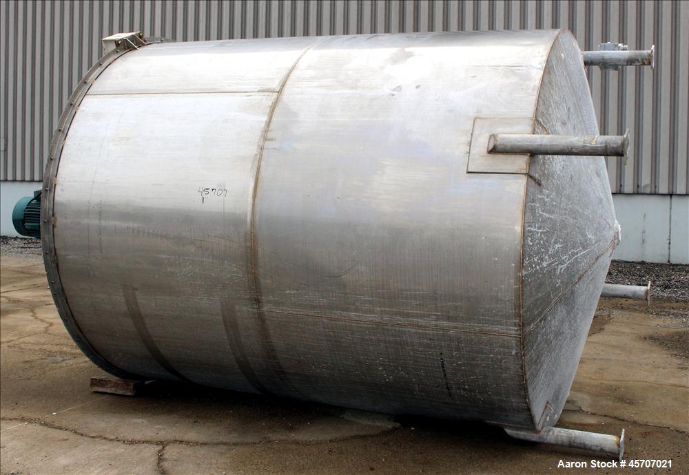 Used Bright Sheet Metal Tank, Approximately 4,000 Gallon, 304 Stainless Steel, Vertical. 100" diameter x 120" straight side. Flat top, coned bottom. 34" x 32" top hinged manway cover, 2" center botto...