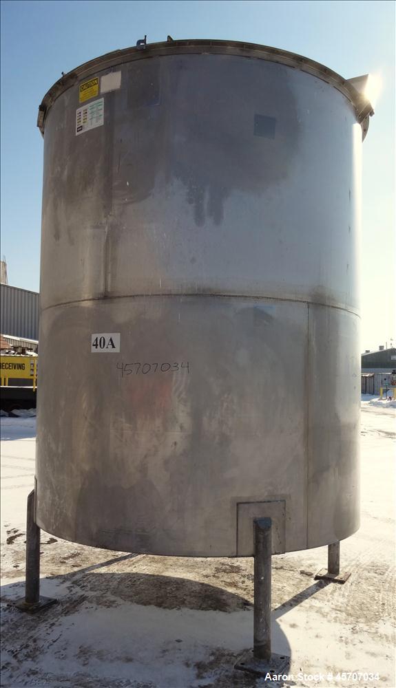 Used- Bright Sheet Metal Tank, Approximately 4,000 Gallon, 304 Stainless Steel, 