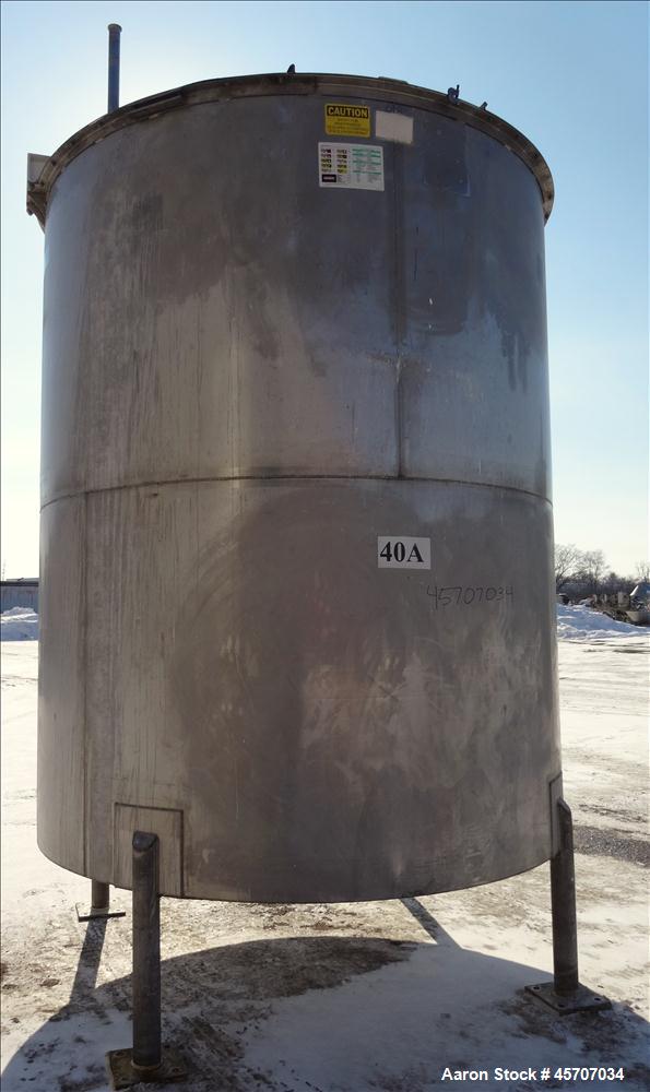 Used- Bright Sheet Metal Tank, Approximately 4,000 Gallon, 304 Stainless Steel, 