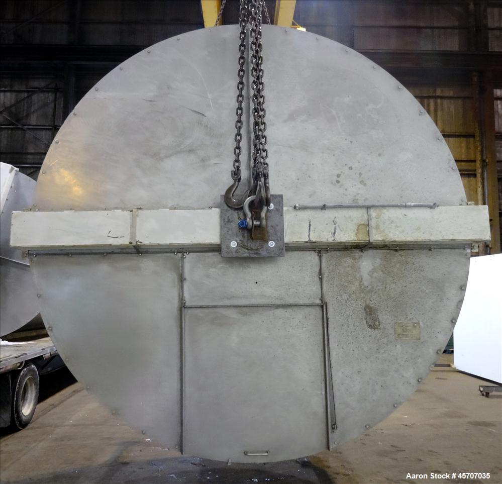 Used Bright Sheet Metal Tank, Approximately 4,000 Gallon, 304 Stainless Steel. 100" diameter x 120" straight side. Cone bottom. 2" center bottom outlet, 34" X 32" top hinged manway cover. (4) Interna...