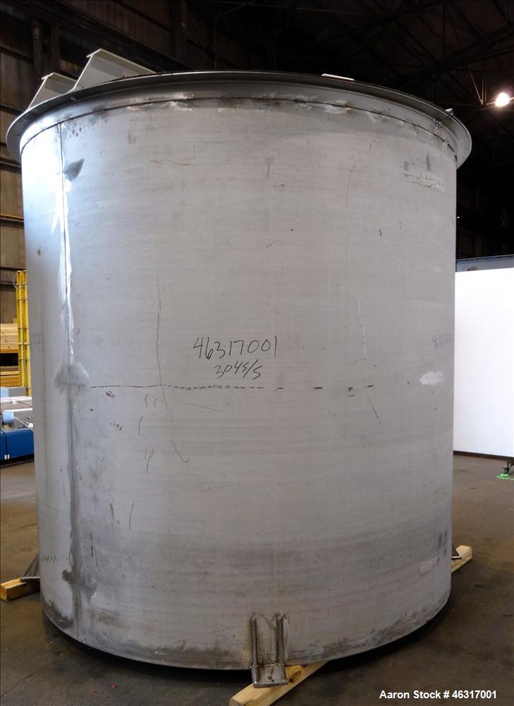Unused- Tank, Approximately 3,000 Gallon, 304 Stainless steel, Vertical. Approximately 102" diameter x 99" straight side. Flat top with hinged covers, sloped bottom. Top bolt on bridge mounted agitat...