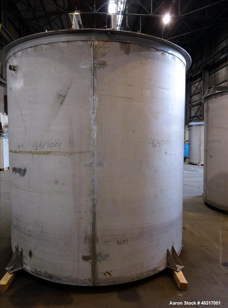 Unused- Tank, Approximately 3,000 Gallon, 304 Stainless steel, Vertical. Approximately 102" diameter x 99" straight side. Flat top with hinged covers, sloped bottom. Top bolt on bridge mounted agitat...