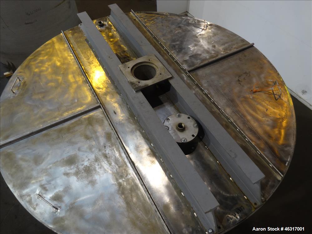 Unused- Tank, Approximately 3,000 Gallon, 304 Stainless steel, Vertical. Approximately 102" diameter x 99" straight side. Flat top with hinged covers, sloped bottom. Top bolt on bridge mounted agitat...