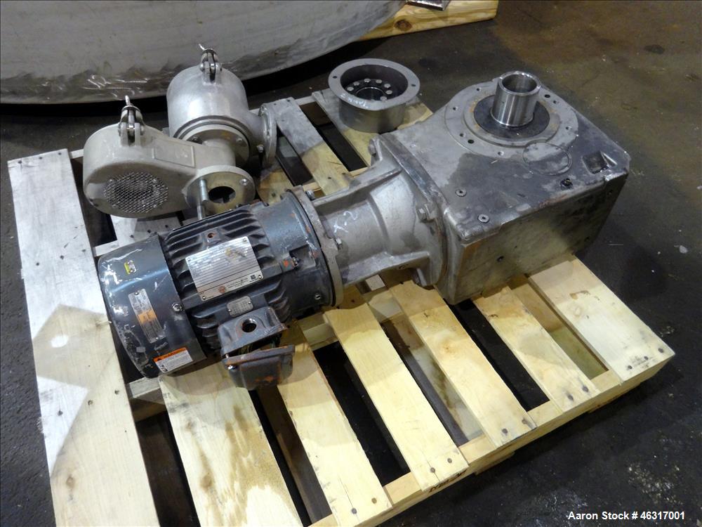Unused- Tank, Approximately 3,000 Gallon, 304 Stainless steel, Vertical. Approximately 102" diameter x 99" straight side. Flat top with hinged covers, sloped bottom. Top bolt on bridge mounted agitat...