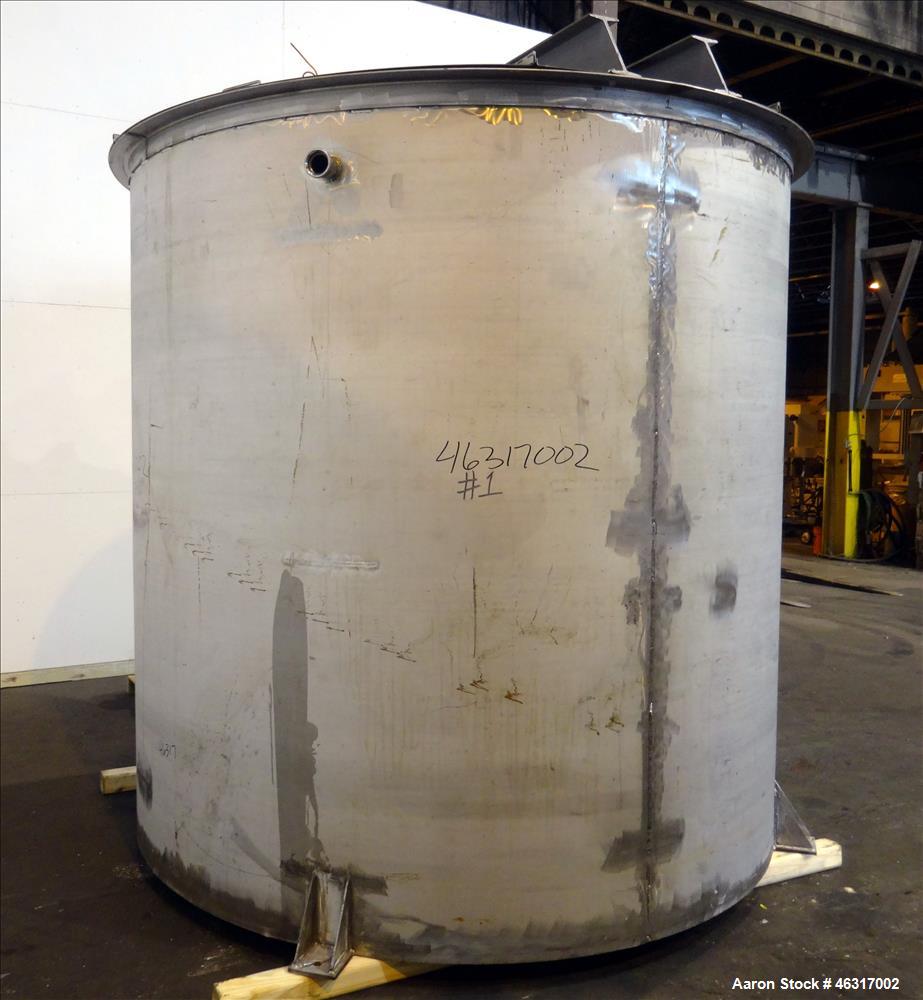 Unused- Tank, Approximately 3,000 Gallon, 304 Stainless steel, Vertical. Approximately 102" diameter x 99" straight side. Flat top with hinged covers, sloped bottom. Top bolt on carbon steel agitator...