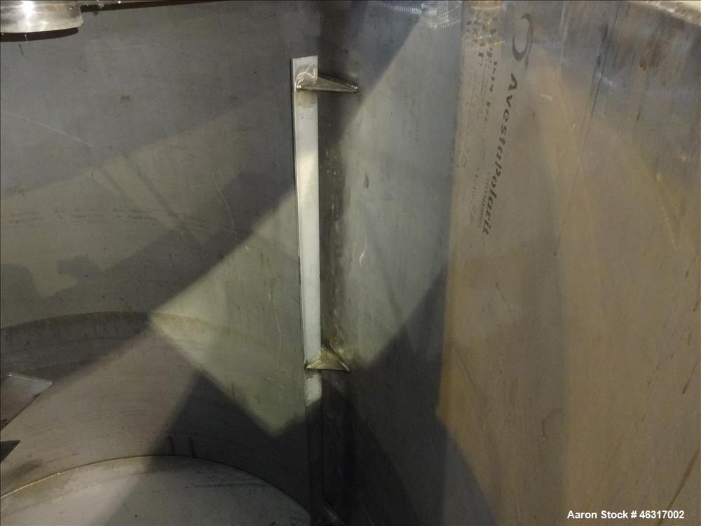 Unused- Tank, Approximately 3,000 Gallon, 304 Stainless steel, Vertical. Approximately 102" diameter x 99" straight side. Flat top with hinged covers, sloped bottom. Top bolt on carbon steel agitator...