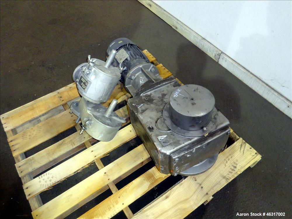 Unused- Tank, Approximately 3,000 Gallon, 304 Stainless steel, Vertical. Approximately 102" diameter x 99" straight side. Flat top with hinged covers, sloped bottom. Top bolt on carbon steel agitator...