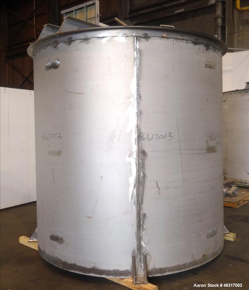 Unused- Tank, Approximately 3,000 Gallon, 304 Stainless steel, Vertical. Approximately 102" diameter x 99" straight side. Flat top with hinged covers, sloped bottom. Top bolt on carbon steel agitator...