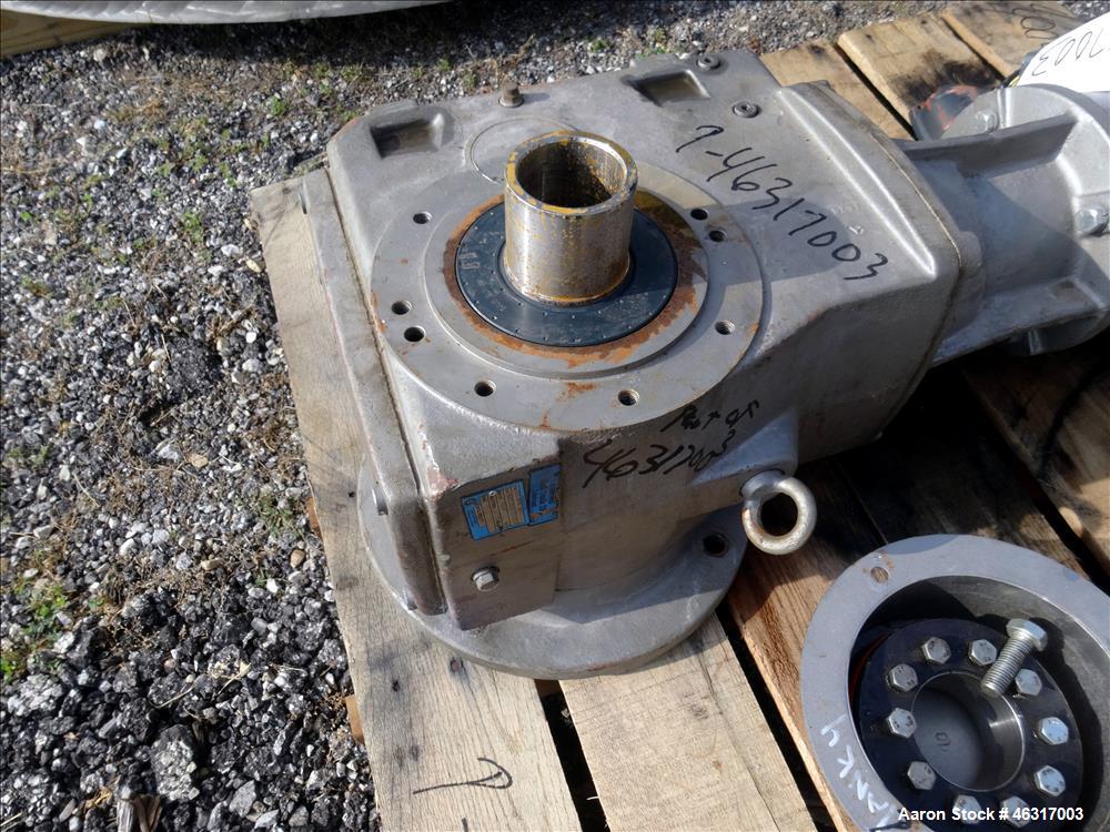 Unused- Tank, Approximately 3,000 Gallon, 304 Stainless steel, Vertical. Approximately 102" diameter x 99" straight side. Flat top with hinged covers, sloped bottom. Top bolt on carbon steel agitator...