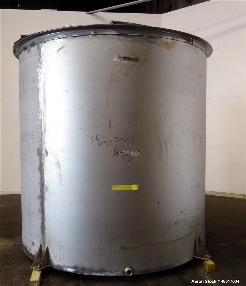 Unused- Tank, Approximately 3,000 Gallon, 304 Stainless steel, Vertical. Approximately 102" diameter x 99" straight side. Flat top with hinged covers, sloped bottom. Top bolt on bridge mounted agitat...