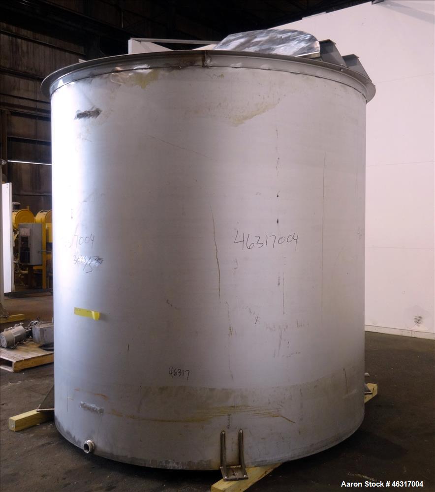 Unused- Tank, Approximately 3,000 Gallon, 304 Stainless steel, Vertical. Approximately 102" diameter x 99" straight side. Flat top with hinged covers, sloped bottom. Top bolt on bridge mounted agitat...