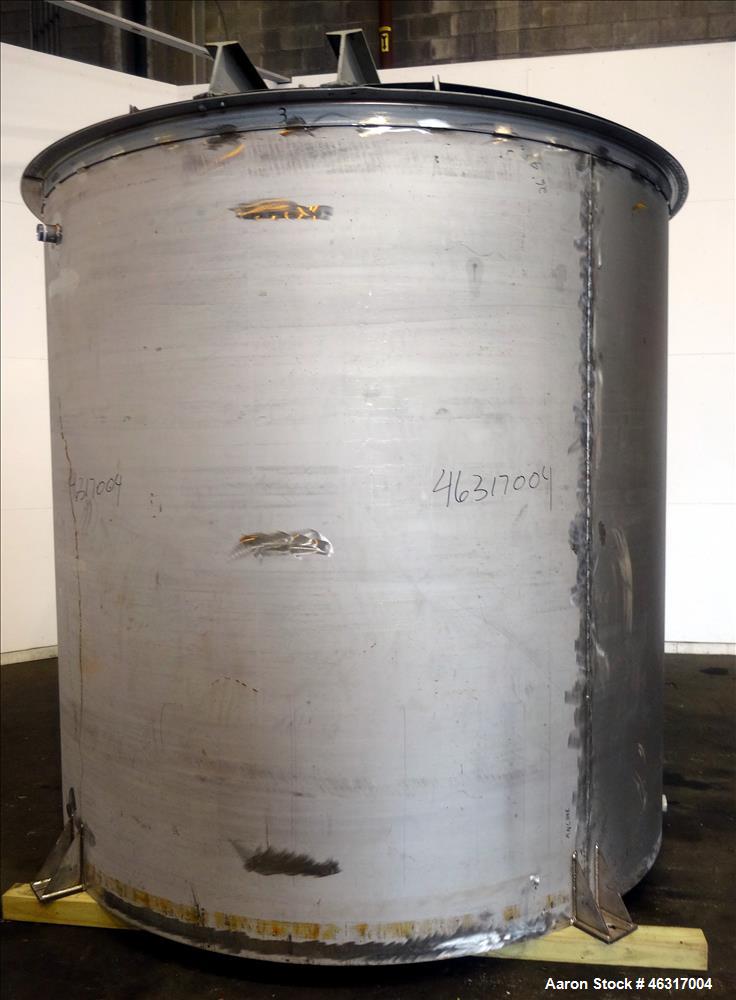 Unused- Tank, Approximately 3,000 Gallon, 304 Stainless steel, Vertical. Approximately 102" diameter x 99" straight side. Flat top with hinged covers, sloped bottom. Top bolt on bridge mounted agitat...