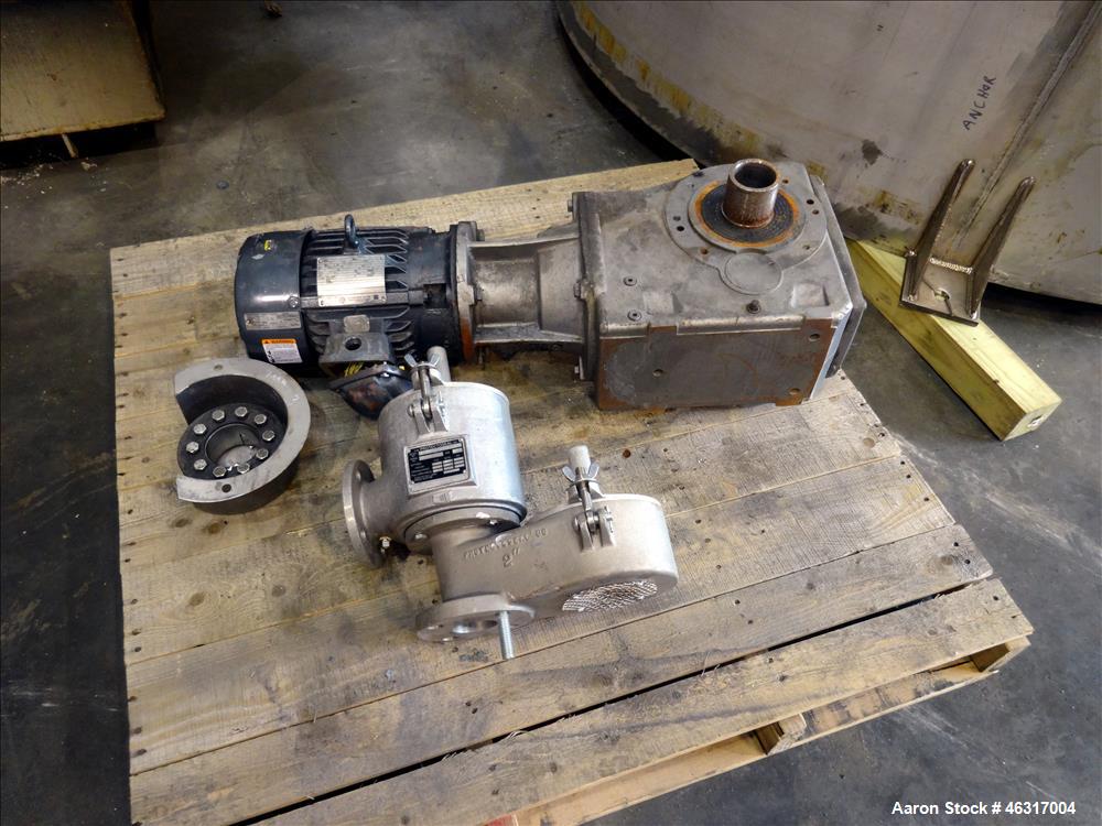 Unused- Tank, Approximately 3,000 Gallon, 304 Stainless steel, Vertical. Approximately 102" diameter x 99" straight side. Flat top with hinged covers, sloped bottom. Top bolt on bridge mounted agitat...
