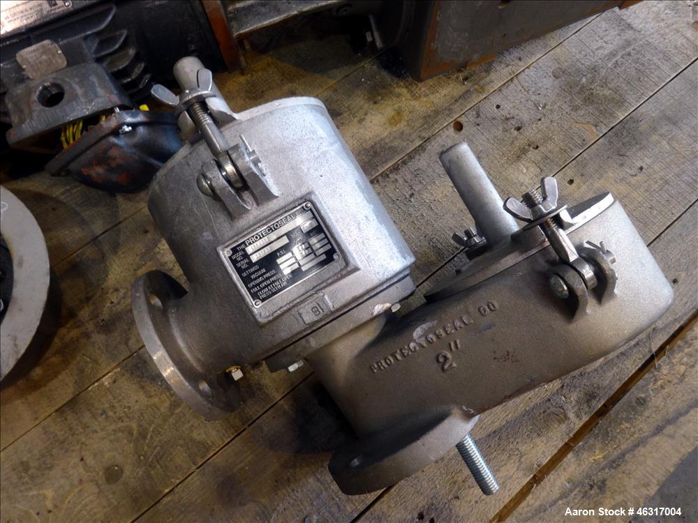 Unused- Tank, Approximately 3,000 Gallon, 304 Stainless steel, Vertical. Approximately 102" diameter x 99" straight side. Flat top with hinged covers, sloped bottom. Top bolt on bridge mounted agitat...