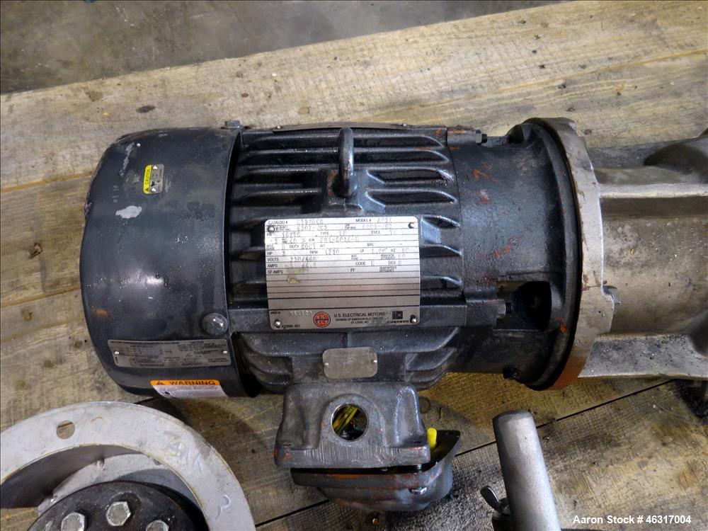 Unused- Tank, Approximately 3,000 Gallon, 304 Stainless steel, Vertical. Approximately 102" diameter x 99" straight side. Flat top with hinged covers, sloped bottom. Top bolt on bridge mounted agitat...
