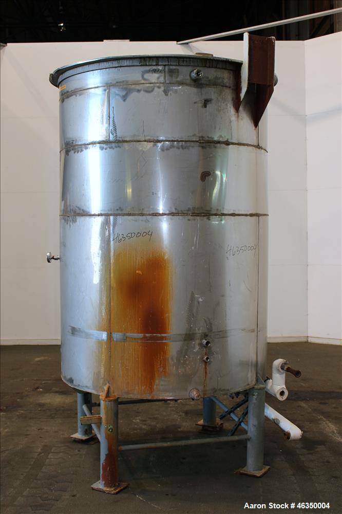 Used Tank, Approximate 1,000 Gallon, 304 Stainless Steel, Vertical. Approximate 60" diameter x 82" straight side. Flat top with hinged covers, flat bottom. Openings side (2) 1-1/2" threaded, 1" threa...