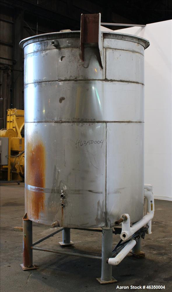 Used Tank, Approximate 1,000 Gallon, 304 Stainless Steel, Vertical. Approximate 60" diameter x 82" straight side. Flat top with hinged covers, flat bottom. Openings side (2) 1-1/2" threaded, 1" threa...