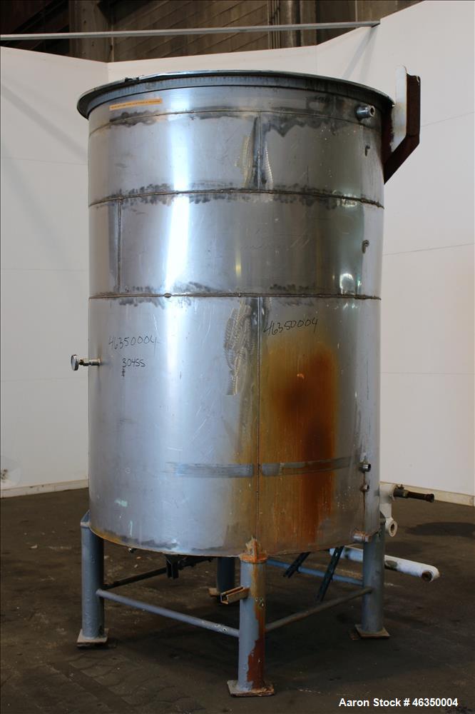 Used Tank, Approximate 1,000 Gallon, 304 Stainless Steel, Vertical. Approximate 60" diameter x 82" straight side. Flat top with hinged covers, flat bottom. Openings side (2) 1-1/2" threaded, 1" threa...