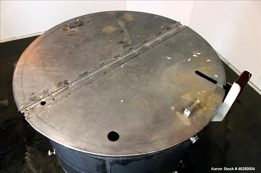 Used Tank, Approximate 1,000 Gallon, 304 Stainless Steel, Vertical. Approximate 60" diameter x 82" straight side. Flat top with hinged covers, flat bottom. Openings side (2) 1-1/2" threaded, 1" threa...