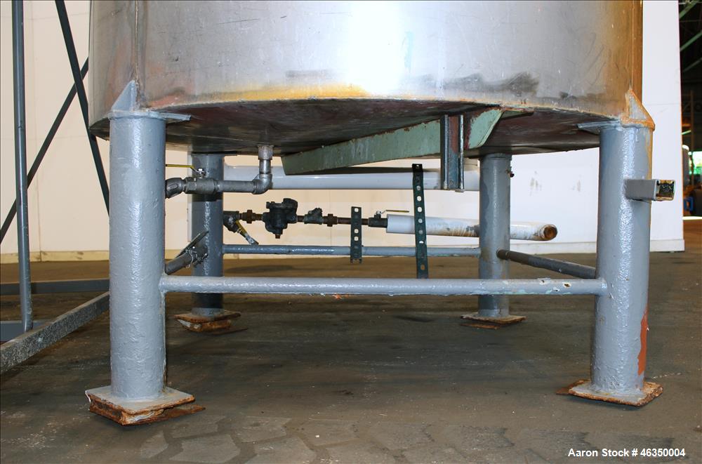 Used Tank, Approximate 1,000 Gallon, 304 Stainless Steel, Vertical. Approximate 60" diameter x 82" straight side. Flat top with hinged covers, flat bottom. Openings side (2) 1-1/2" threaded, 1" threa...
