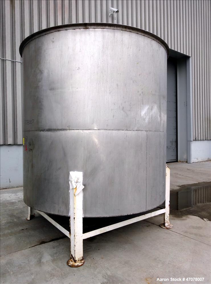 Used Tank, Approximate 4,000 Gallon, 304 Stainless Steel, Vertical. Approximate 108" diameter x 105" straight side. Open top with lift off cover, dished bottom. 2" Center bottom outlet. Mounted on (4...