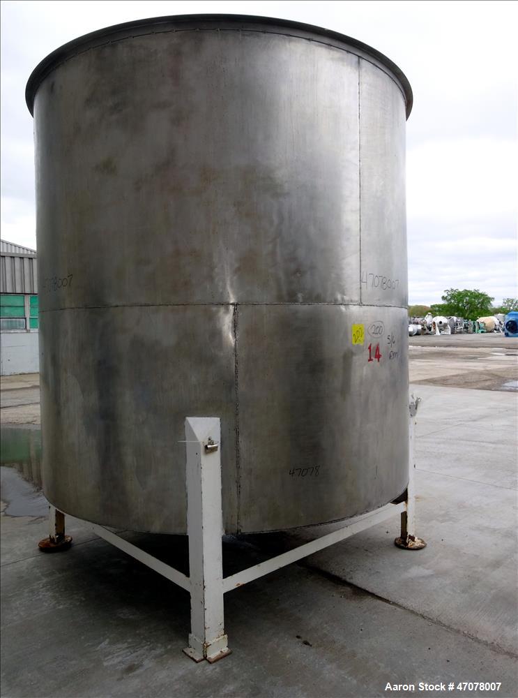Used Tank, Approximate 4,000 Gallon, 304 Stainless Steel, Vertical. Approximate 108" diameter x 105" straight side. Open top with lift off cover, dished bottom. 2" Center bottom outlet. Mounted on (4...