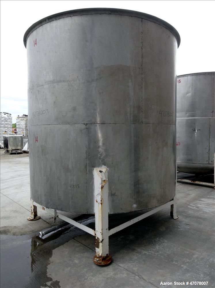 Used Tank, Approximate 4,000 Gallon, 304 Stainless Steel, Vertical. Approximate 108" diameter x 105" straight side. Open top with lift off cover, dished bottom. 2" Center bottom outlet. Mounted on (4...