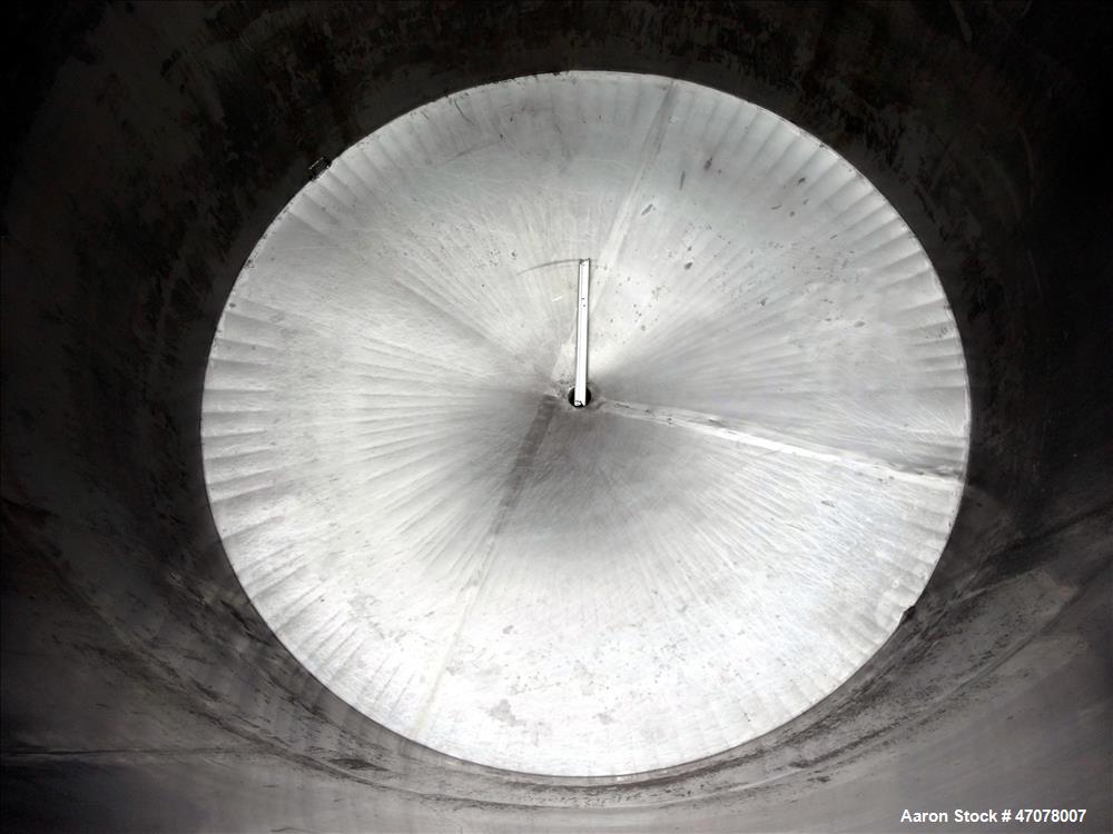 Used Tank, Approximate 4,000 Gallon, 304 Stainless Steel, Vertical. Approximate 108" diameter x 105" straight side. Open top with lift off cover, dished bottom. 2" Center bottom outlet. Mounted on (4...