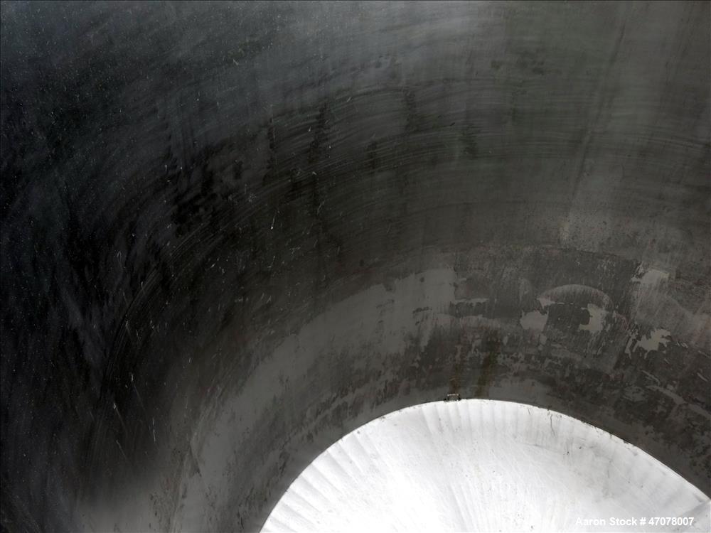 Used Tank, Approximate 4,000 Gallon, 304 Stainless Steel, Vertical. Approximate 108" diameter x 105" straight side. Open top with lift off cover, dished bottom. 2" Center bottom outlet. Mounted on (4...