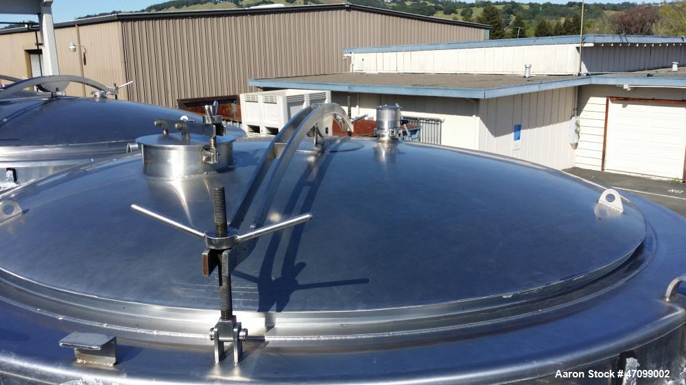 Used- Approx. 3000 Gallon Stainless Steel Jacketed Wine Tank. Approx. 96" diameter x 96" straight side. Open top with a stai...