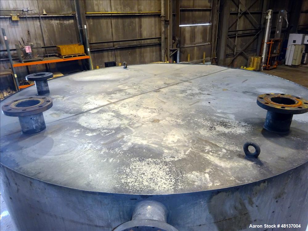 Used Tank, 4,000 Gallon, 304 Stainless steel, Vertical. Approximate 89" diameter x 155" straight side, flat top, cone bottom. Top openings: 3", (2) 4". Side openings: 18" man way with cover, 4", 8" c...