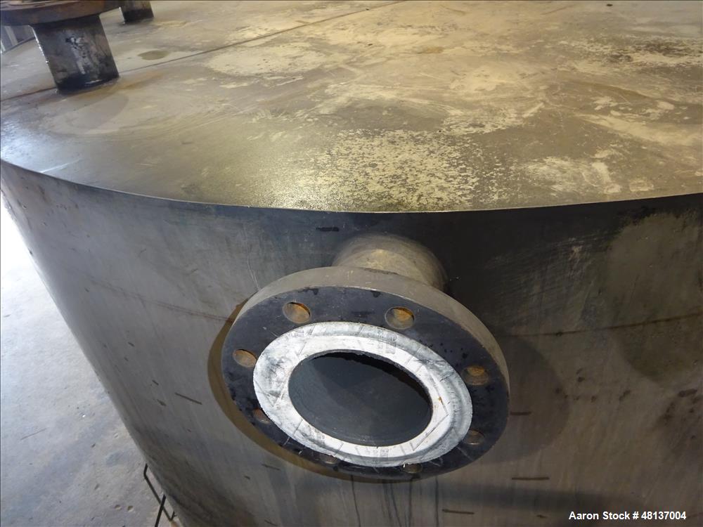 Used Tank, 4,000 Gallon, 304 Stainless steel, Vertical. Approximate 89" diameter x 155" straight side, flat top, cone bottom. Top openings: 3", (2) 4". Side openings: 18" man way with cover, 4", 8" c...