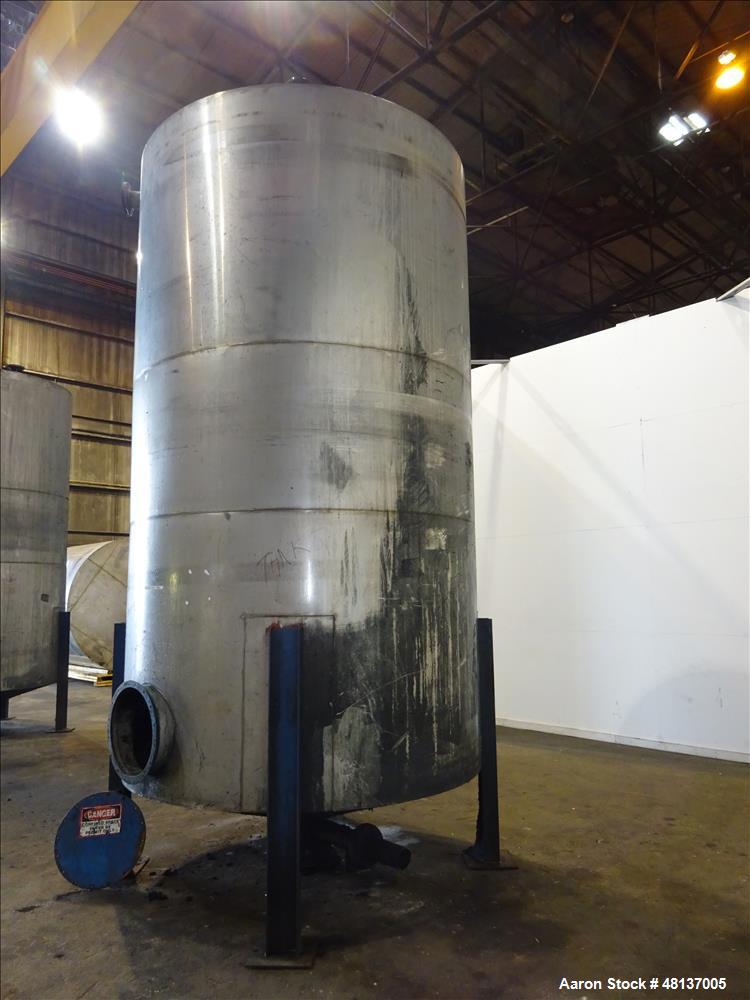 Used Tank, 4,000 Gallon, 304 Stainless steel, Vertical. Approximate 88" diameter x 155" straight side, flat top, cone bottom. Top openings: 3", (2) 4. Side openings: 18" man way with cover, 4", 8" ce...