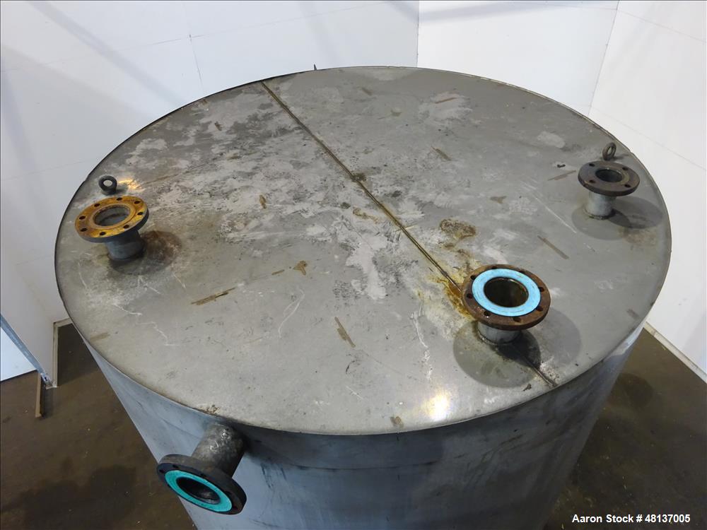 Used Tank, 4,000 Gallon, 304 Stainless steel, Vertical. Approximate 88" diameter x 155" straight side, flat top, cone bottom. Top openings: 3", (2) 4. Side openings: 18" man way with cover, 4", 8" ce...